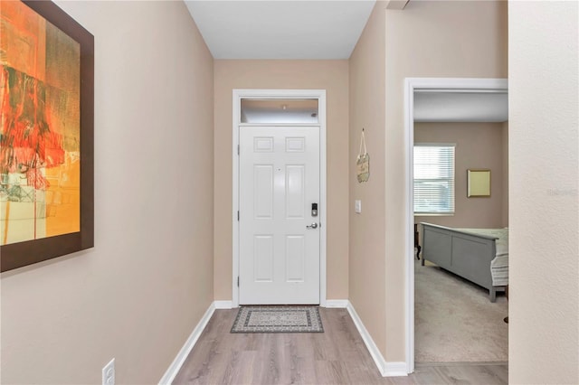 entrance foyer featuring light hardwood / wood-style floors