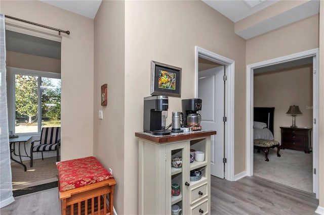 hallway with light wood-type flooring