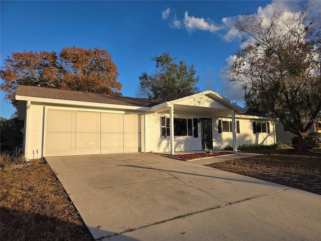 ranch-style home with a garage