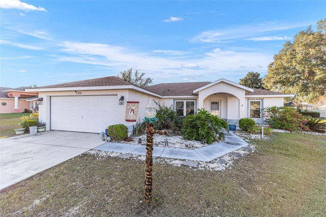 single story home featuring a garage