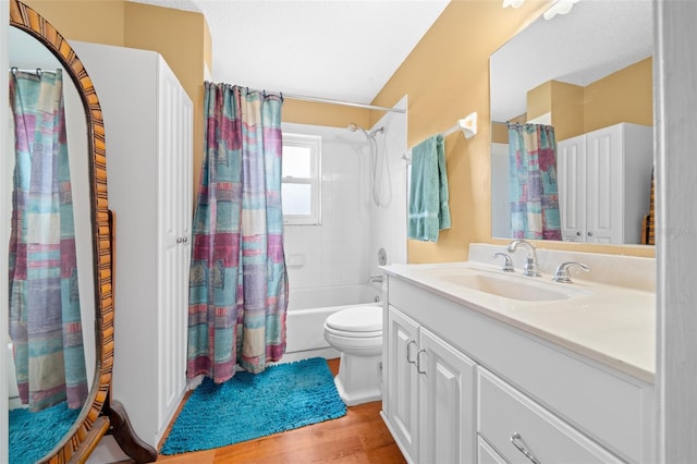 full bathroom featuring toilet, vanity, shower / bath combo, and hardwood / wood-style flooring