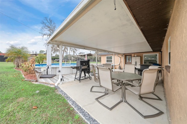 view of patio / terrace featuring a fenced in pool