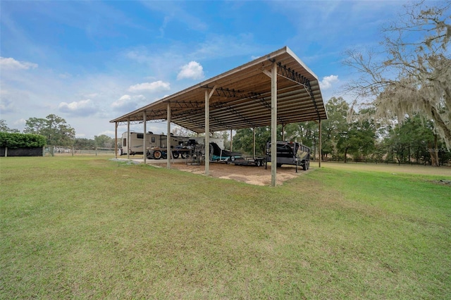 view of yard with a carport