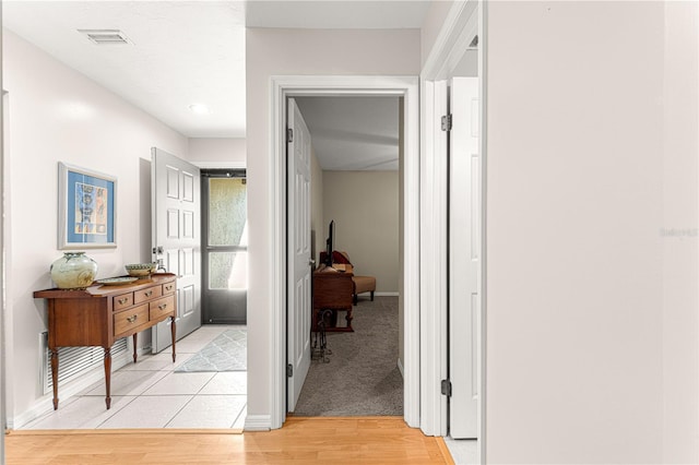 hallway featuring light hardwood / wood-style flooring