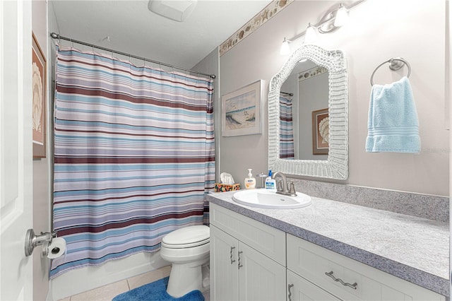 full bathroom with tile patterned floors, shower / bathtub combination with curtain, vanity, and toilet