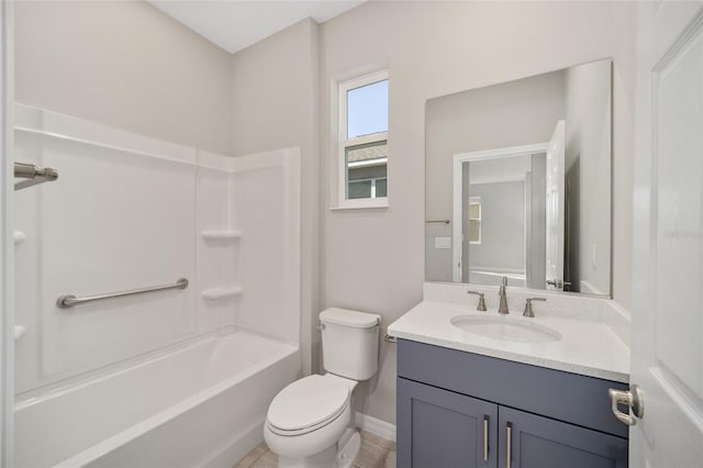 full bathroom featuring washtub / shower combination, vanity, and toilet