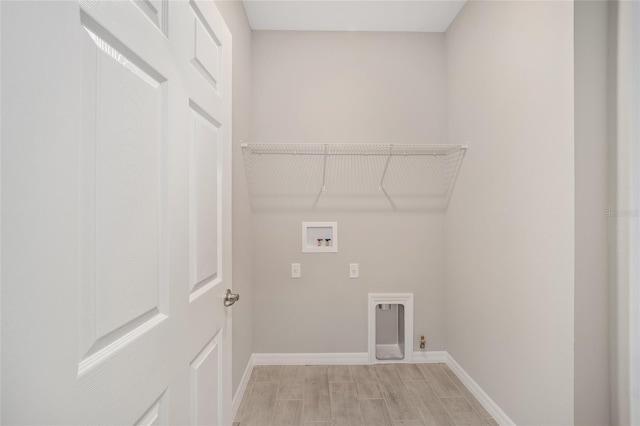 washroom featuring electric dryer hookup and washer hookup