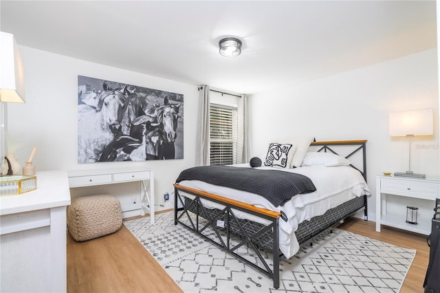 bedroom featuring light hardwood / wood-style floors