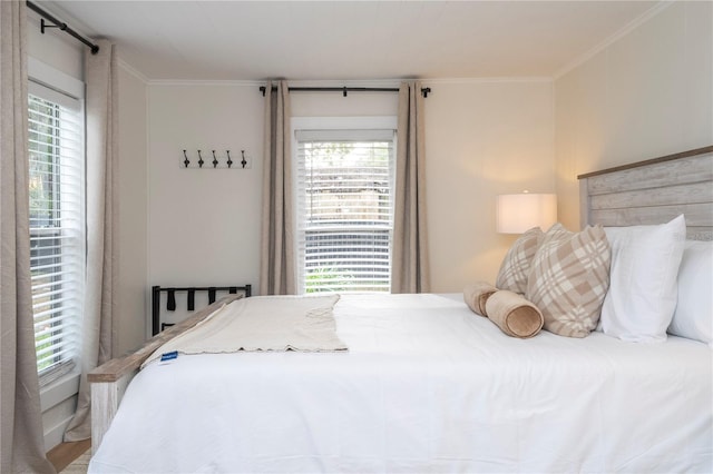 bedroom featuring crown molding