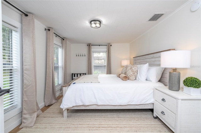 bedroom featuring light hardwood / wood-style floors