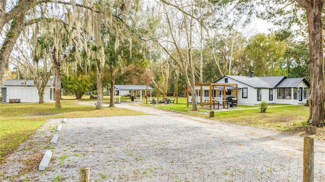 exterior space with a front yard