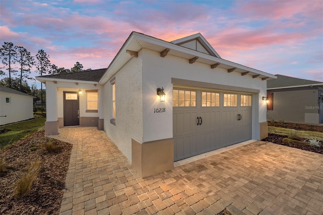 view of front of house with a garage