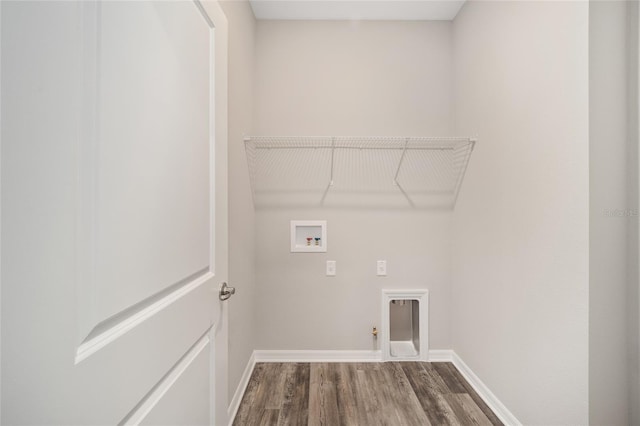 laundry room featuring electric dryer hookup, hookup for a gas dryer, washer hookup, and wood-type flooring