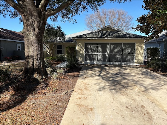 single story home with a garage