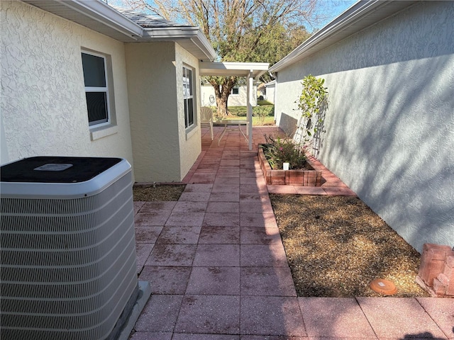 view of patio featuring cooling unit