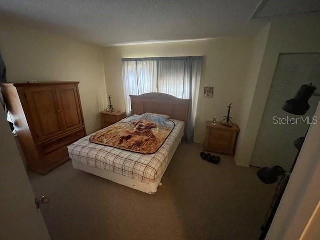 7945 Midway Drive Ter Unit H201, Ocala, FL 34472 - view of carpeted bedroom