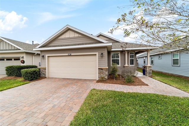 view of front facade with a front lawn and a garage