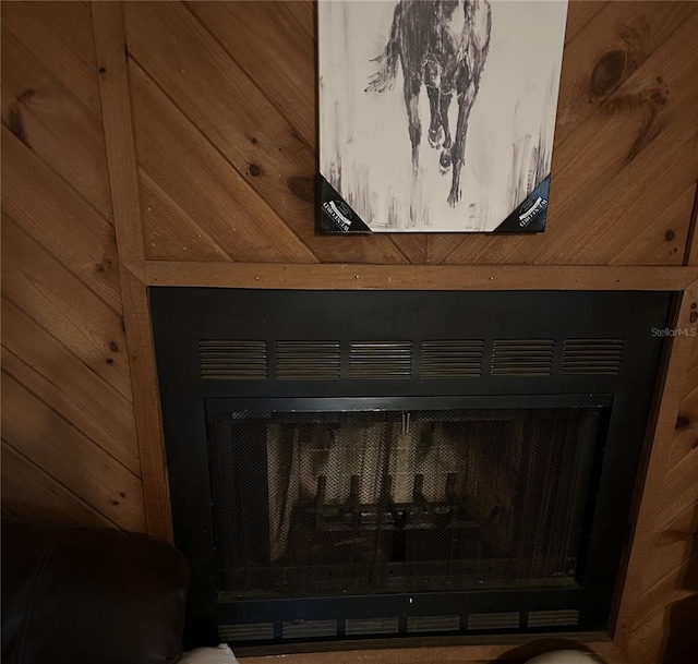 room details featuring wood walls