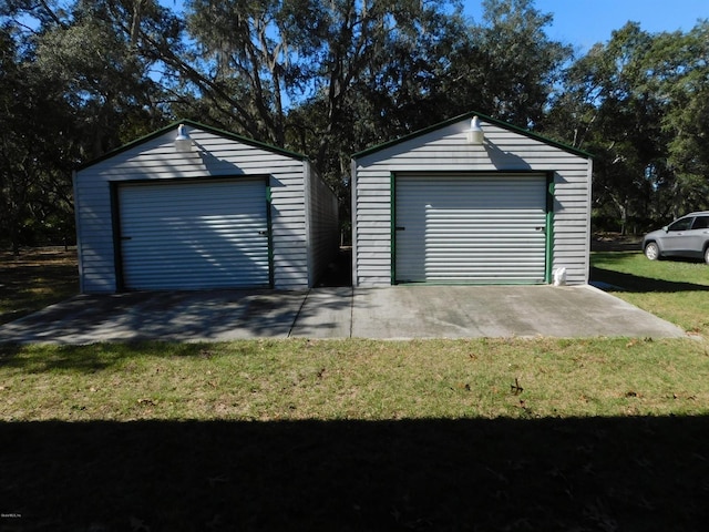 garage with a yard