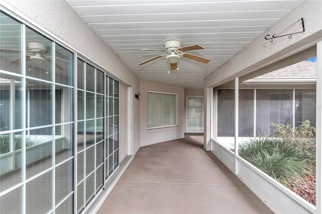 balcony featuring ceiling fan