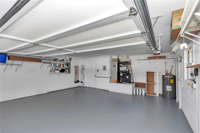 garage with electric water heater, heating unit, and a garage door opener