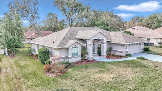 view of front of home with a garage and a front yard