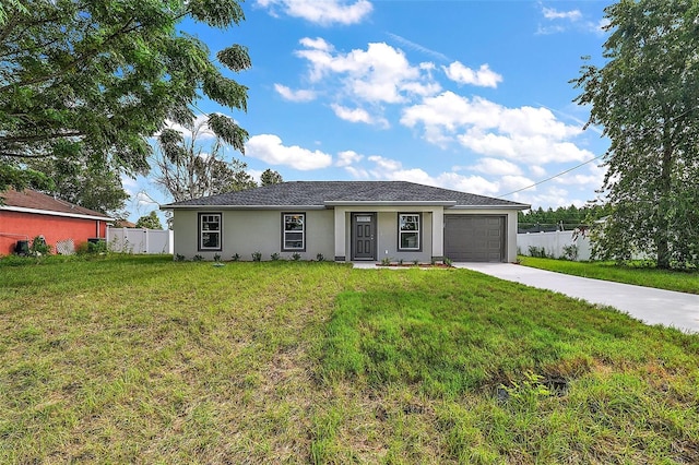 single story home featuring a garage and a front lawn