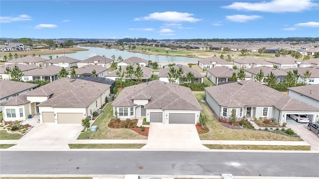 bird's eye view with a water view