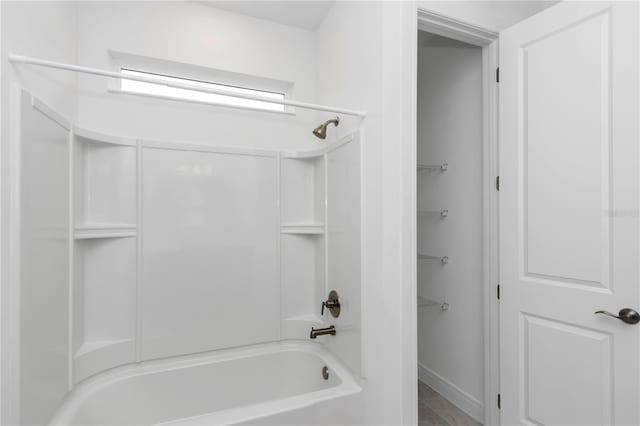 bathroom with shower / bathing tub combination