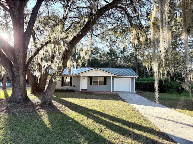 ranch-style home featuring a front yard and a garage