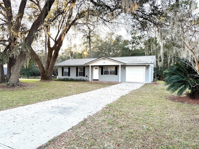 single story home with a garage and a front lawn