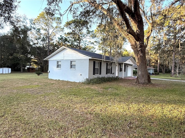 view of front of home with a front yard