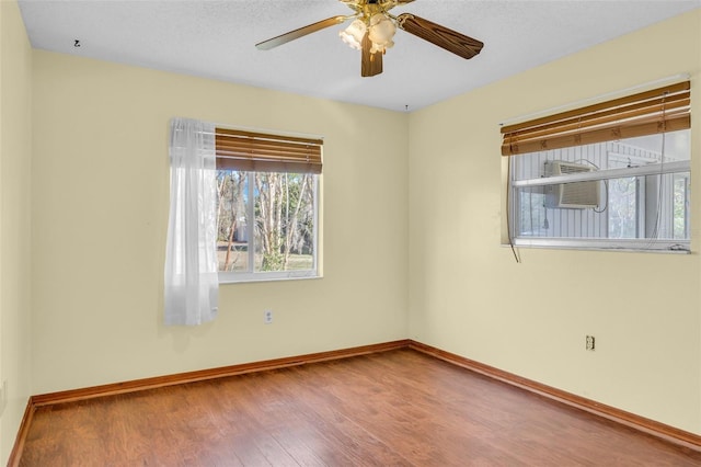 unfurnished room featuring ceiling fan and wood-type flooring