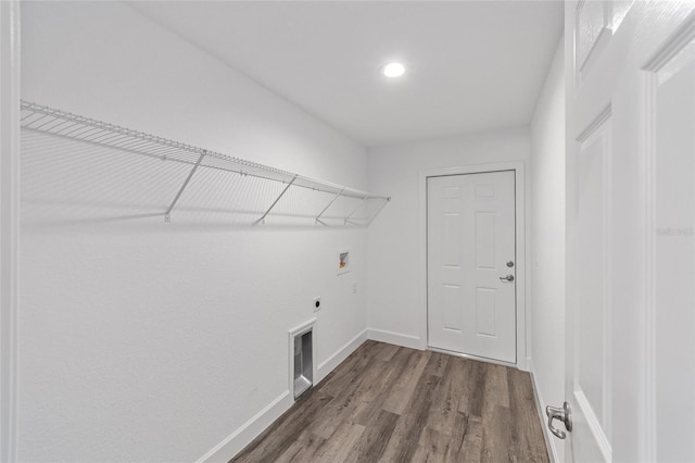 laundry room featuring hookup for a washing machine, dark hardwood / wood-style floors, and hookup for an electric dryer