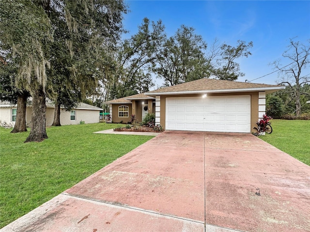 ranch-style home featuring a garage and a front lawn