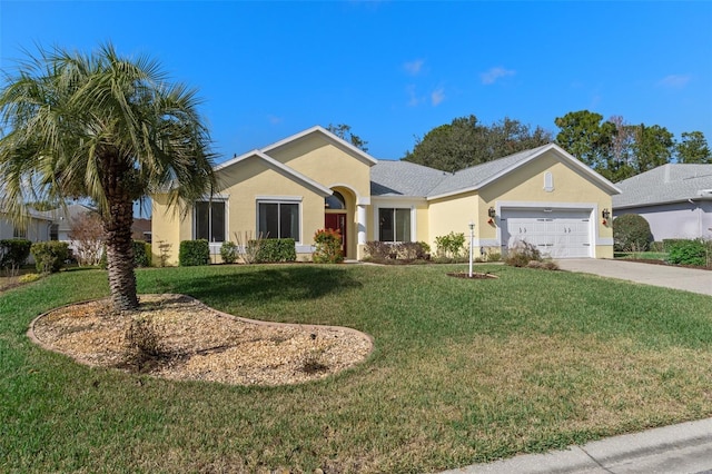 single story home with a front yard and a garage