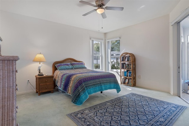 bedroom with light colored carpet and ceiling fan