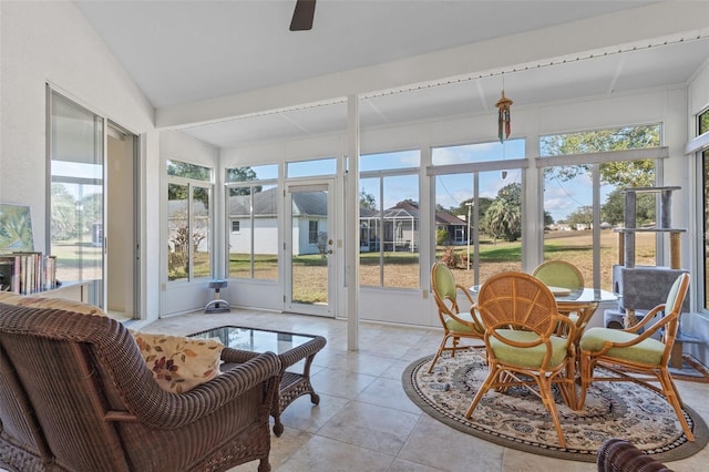 sunroom / solarium with vaulted ceiling and ceiling fan