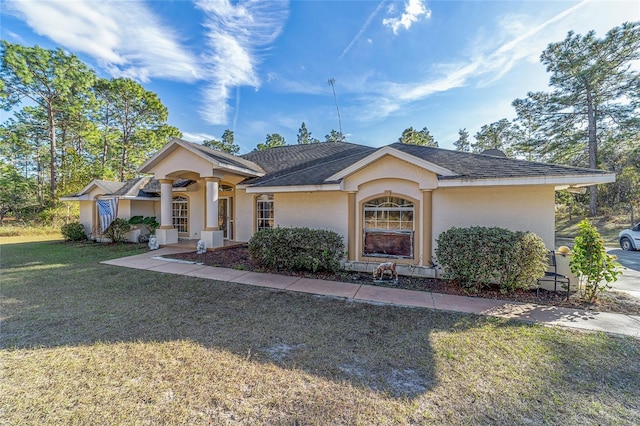 ranch-style house with a front yard