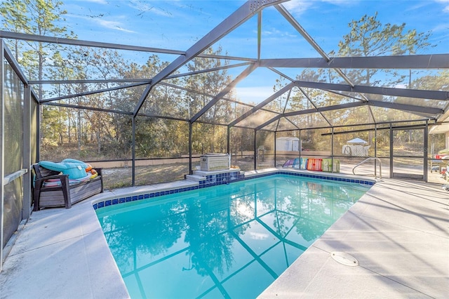 view of pool featuring a patio and a lanai