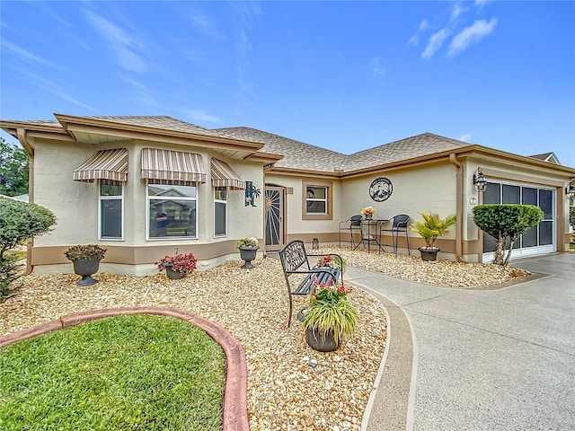 view of front of property featuring a garage