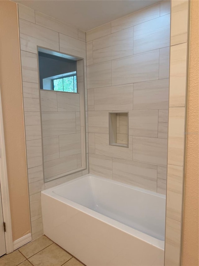 bathroom with tile patterned floors