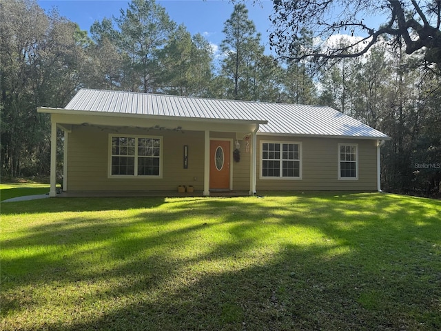 single story home featuring a front lawn