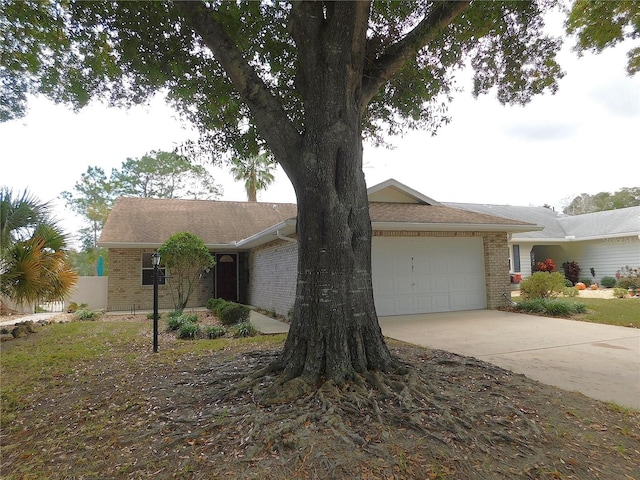 single story home featuring a garage