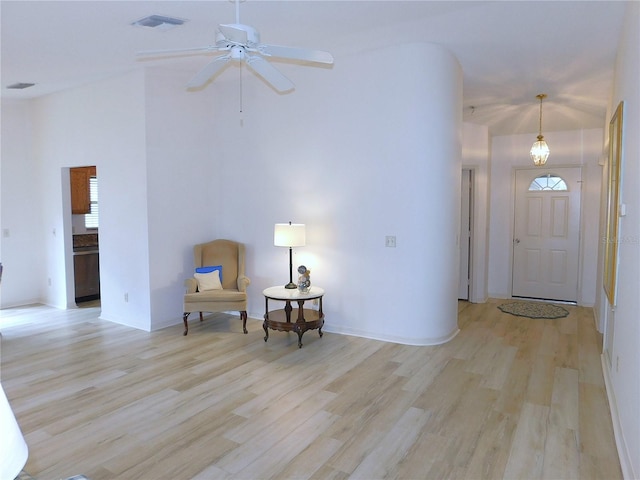 entryway with light hardwood / wood-style flooring and ceiling fan