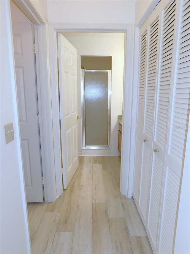 hall featuring light wood-type flooring