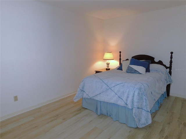 bedroom featuring light wood-type flooring