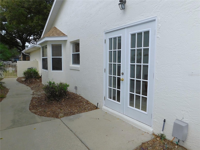 view of home's exterior featuring french doors