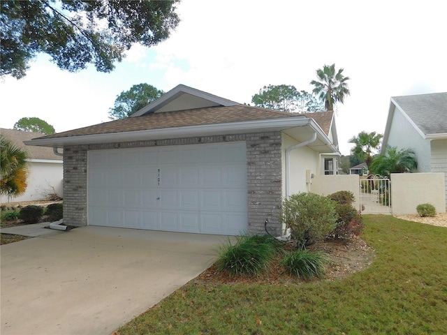 view of side of property featuring a garage