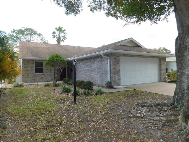 ranch-style house featuring a garage